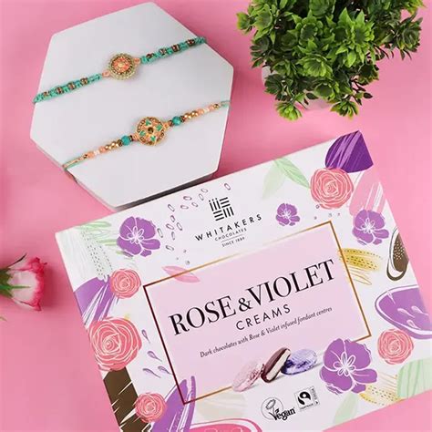 Send Pleasant Rakhi Set with Signature Collection 26 Pcs Chocolate ...