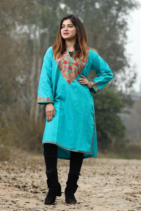 Blue color aari work embroidered kurti with new designer floral