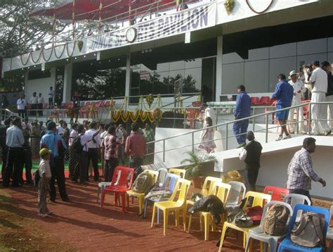 Suresh Raina leads the UP team out of Shimoga's newly inaugurated ...