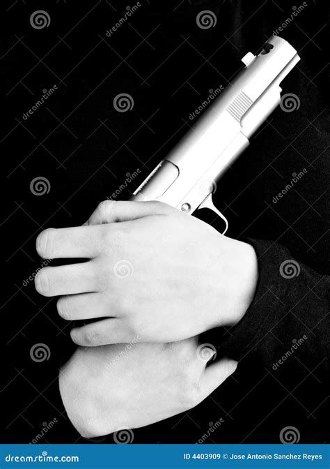 Hands holding a gun stock image. Image of danger, cruel - 4403909