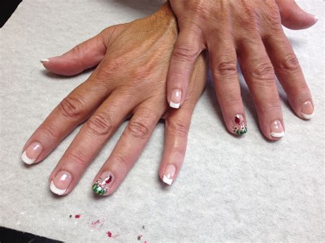 French with ladybug design on accent nails Oasis Salon and Spa Mill ...
