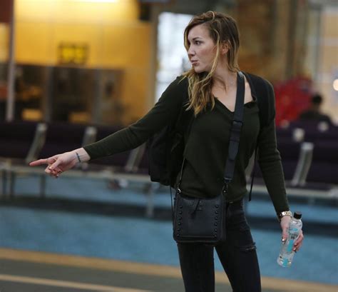 Katie Cassidy at Vancouver International Airport 2/16/ 2017 • CelebMafia