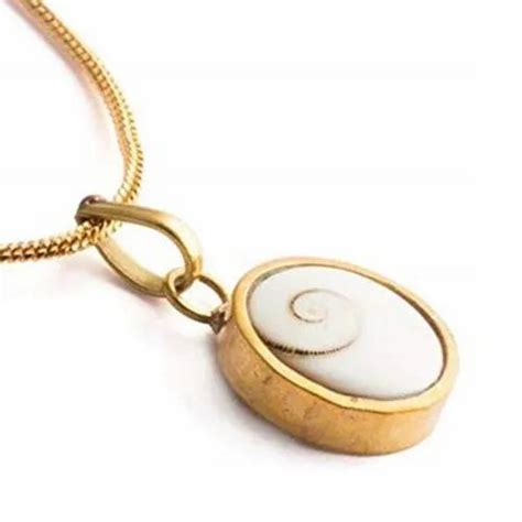 Gomati Chakra - Synthetic Navratna Gomti Chakra Pendant Trader ...