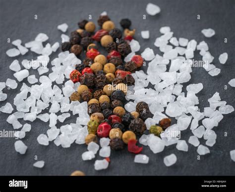 Coarse salt and peppercorns Stock Photo - Alamy