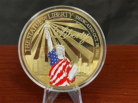 Lot - 70MM 24K GOLD LAYERED PROOF STATUE OF LIBERTY COIN WITH SWAROVSKI ...