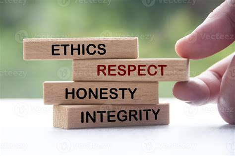 Wooden blocks with words Ethics, Respect, Honesty and Integrity ...