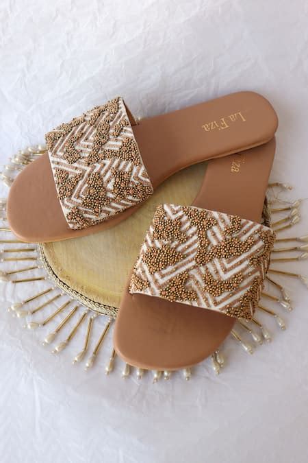 Buy Gold Aahana Embellished Sliders by LA Fiza Online at Aza Fashions.