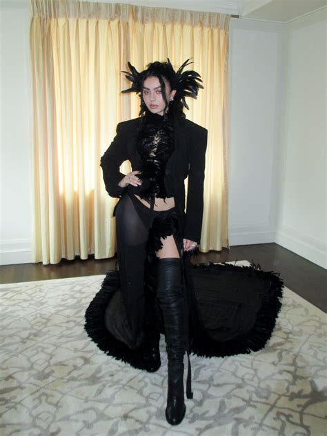 Charli XCX Brings Gothic Glamour—And a Dramatic Feathered Headpiece—to the 2025 Met Gala | Vogue
