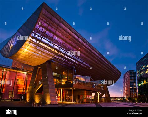 The Lowry Centre at Salford Quays illuminated at sunset Manchester ...