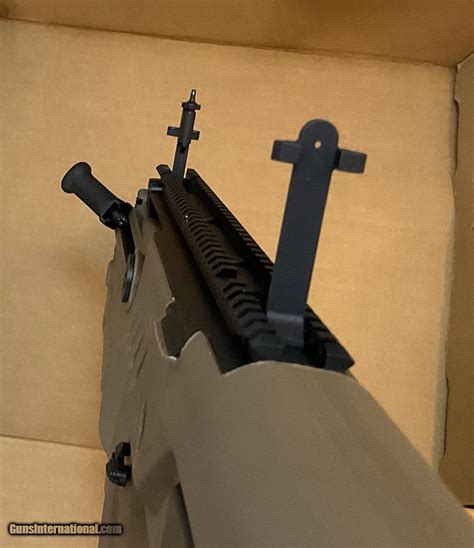 Pre-owned IWI Tavor SAR FDE-18 5.56mm bullpup semi-auto rifle w/ new 30 ...