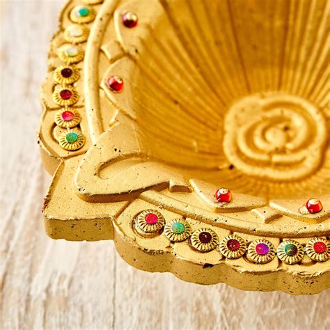Buy Utsav Clay Embellished Akhand Diya from Home Centre at just INR 199.0