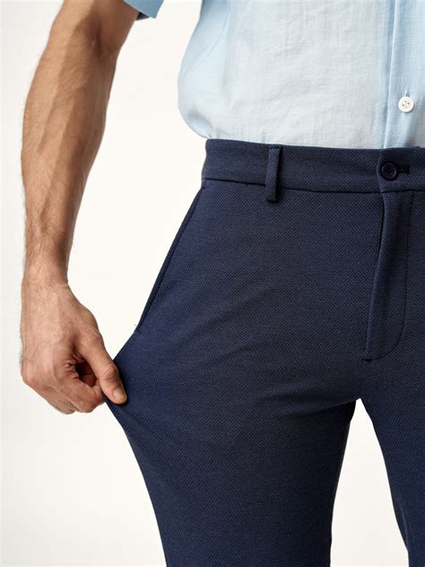 Buy Men's Blue Textured Power-Stretch Pants Online In India