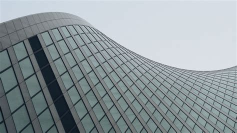 Download wallpaper 2560x1440 building, lines, facade, wave ...