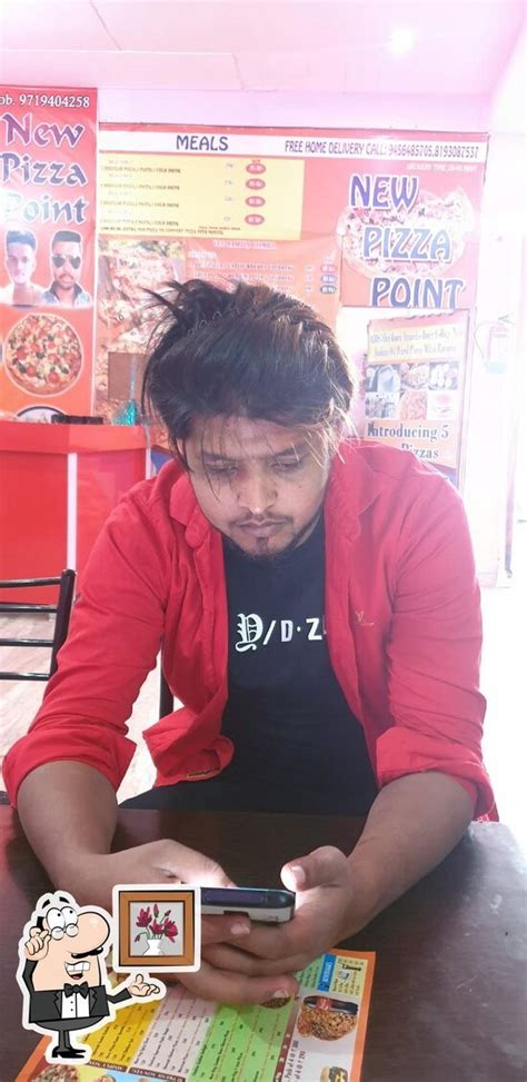 Menu at new pizza point, Milak