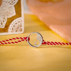 GIVA Designer Oxidised Silver Ganesh Ji Halo Rakhi Silver Rakhi, Chawal ...