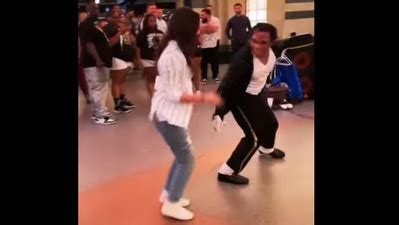 Woman showcases cool moves while dancing with street performer. Watch ...