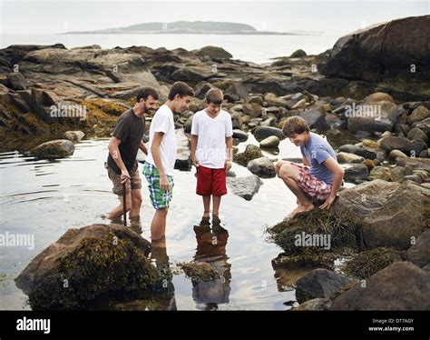 Small Group of People Standing 的图像结果
