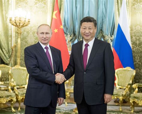 习近平同俄罗斯总统普京举行会谈 _ 滚动新闻 _中国政府网