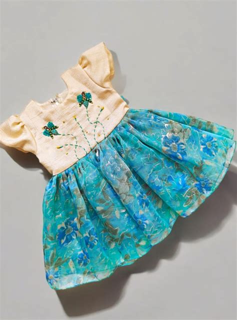 Nyasa silk bodice with foil printed organza bottom dress with handwork ...