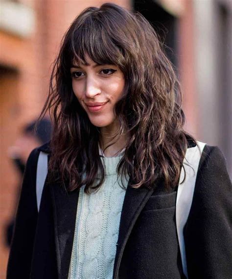 Flaunt Your Curls with These 20 Curly Hairstyles with Bangs