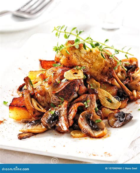Fried Chicken with Mushrooms and Garlic. Stock Photo - Image of golden ...