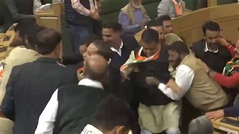 Third day of ruckus in J&K assembly over Article 370: Chaos erupts over ...