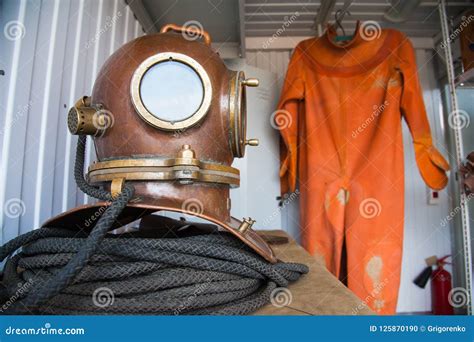Old Vintage Deep Sea Diving Suit Stock Photo - Image of aquatic, suit ...