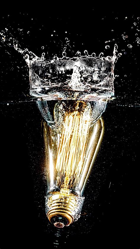 Download wallpaper 1350x2400 light bulb, water, spray, splash, light ...