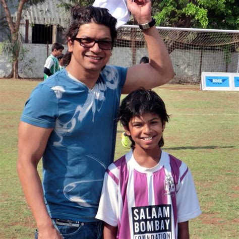 Participants pose with their trophies at Junior Football Championships ...