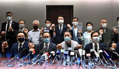 19 pro-democracy Hong Kong lawmakers threaten to resign- The Week