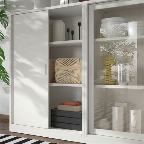 TONSTAD storage combination w sliding doors, off-white/clear glass ...