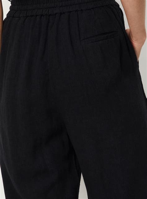 Buy Women Solid Woven Relaxed Fit Trousers Online at just Rs. 1199.0 ...