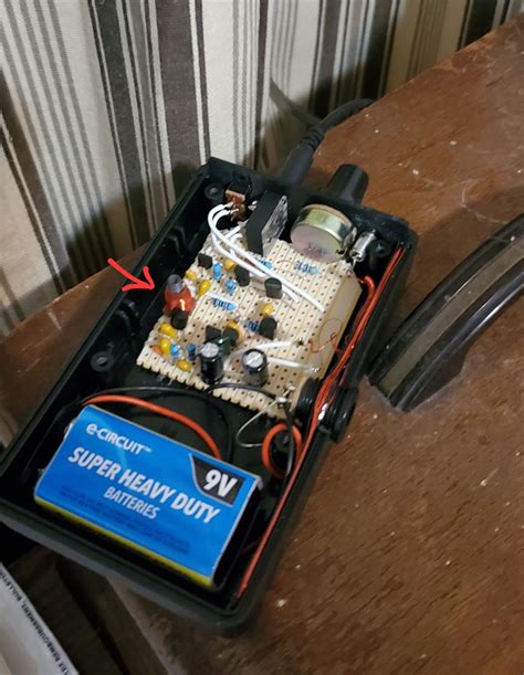 AM transmitter makes high pitch noise on my old radios unless I tap ...