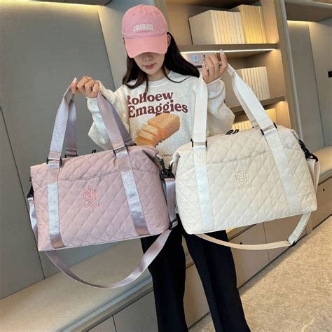 Bolsa organizadora de viaje expandible en beige, liviana y plegable ...