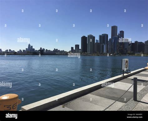 Panorama of waterfront skyline with calm lake and blue sky, chicago ...