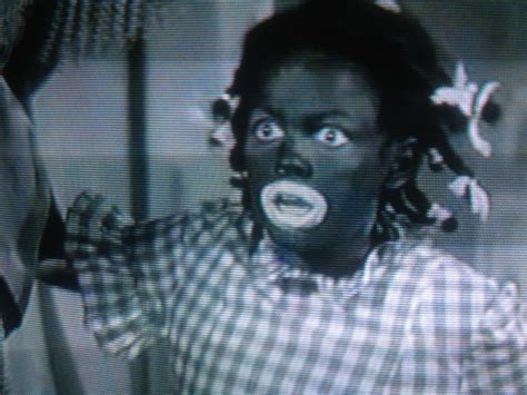 step off george: Judy Garland [blackface]