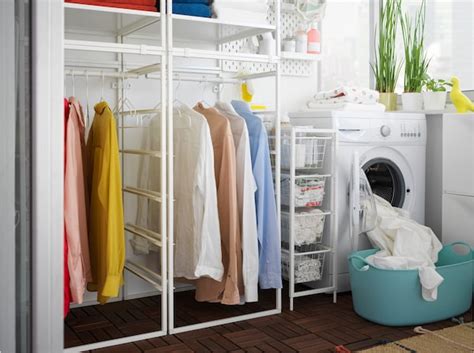 Affordable laundry room with JONAXEL shelving unit - IKEA