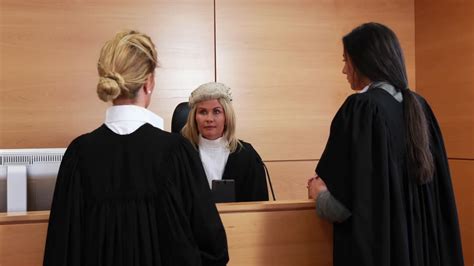 Lawyers standing and listening the judge | Premium Stock Video Footage