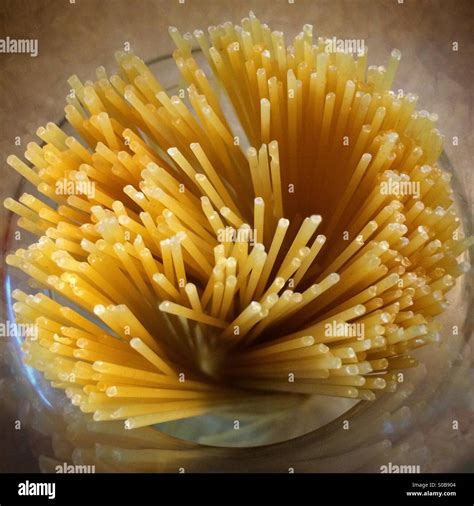 Thin Spaghetti, noodles in glass container Stock Photo - Alamy