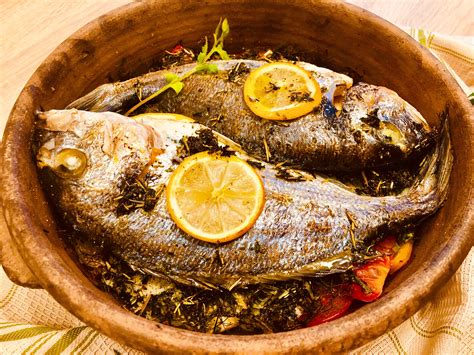 Gilt-head bream, delicious fish in clay pot by Greek Goes Keto