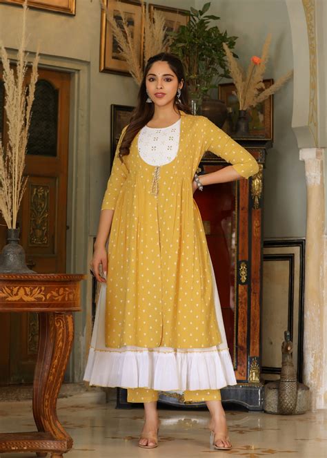 Saira White Tiered Kurta & Yellow Printed Shrug With Pant – EverBloom