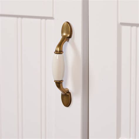 allen + roth 3-in (76Mm) Center to Center Antique Brass and Almond Arch ...