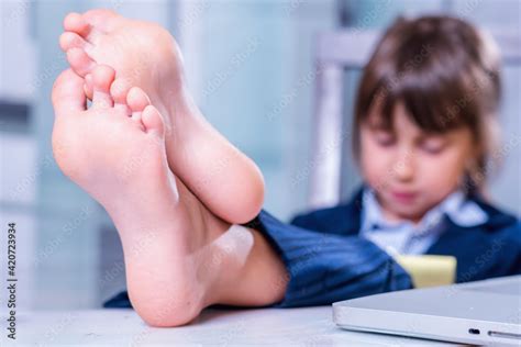 Barefoot Child Using Computer 的图像结果