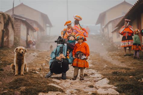 A Journalist Posing with Local People Wearing Traditional Clothing ...