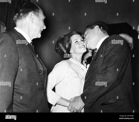 Rep. Thomas Hale Boggs, D-La., House Majority Whip, kisses Sen. James ...