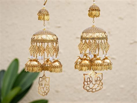Ganpati Golden Bridal Kaleera with Detailing – JashnBazaar