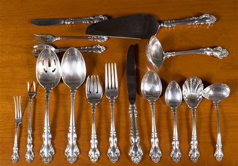Lot - REED & BARTON "SPANISH BAROQUE" SILVER FLATWARE