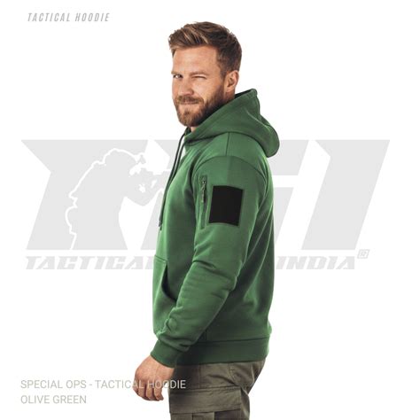 Olive green tactical hoodie with sleeve zipper pockets and velcro patch ...