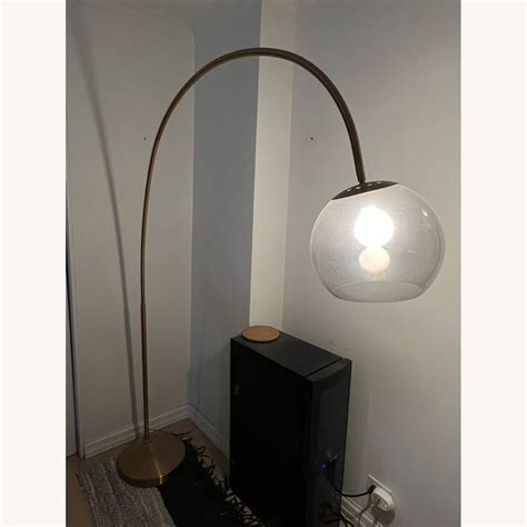 West Elm Overarching Acrylic Shade Floor Lamp - AptDeco