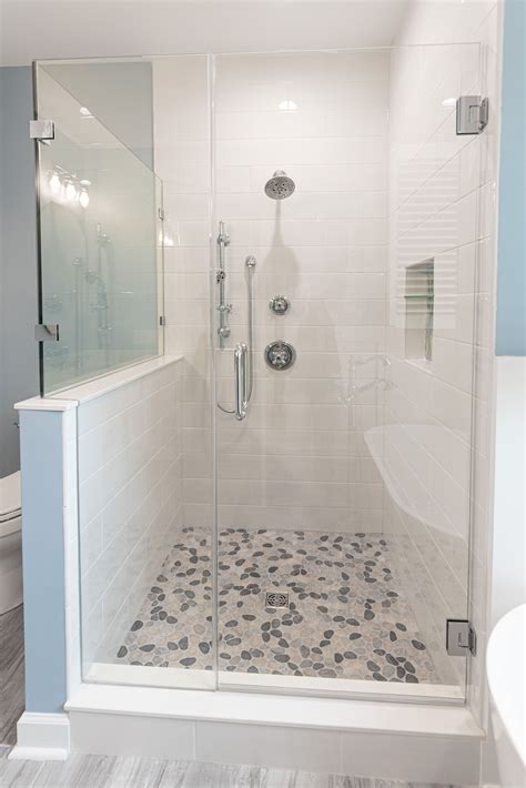 Neutral Pebble Shower Floor and Freestanding Tub
